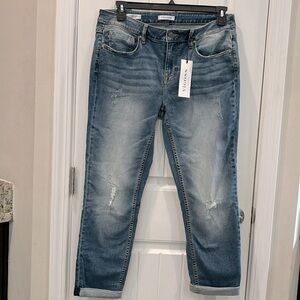 Vigoss Thompson Tomboy cropped rolled hem distressed jeans.